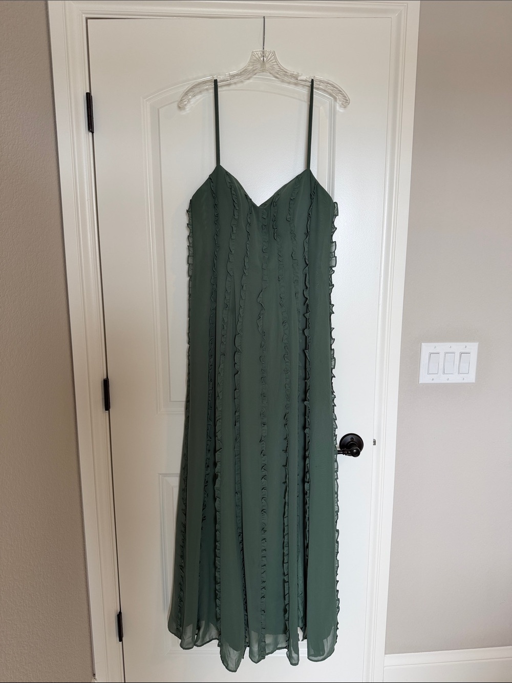 Dark sage green gown with built-in foam cups. By Azizie.